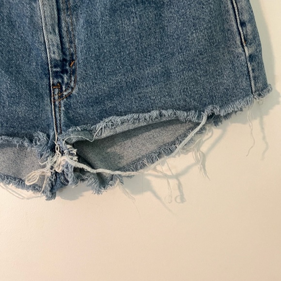 Vintage Levi's Distressed Medium Wash Cut Off Shorts - Picture 7 of 10